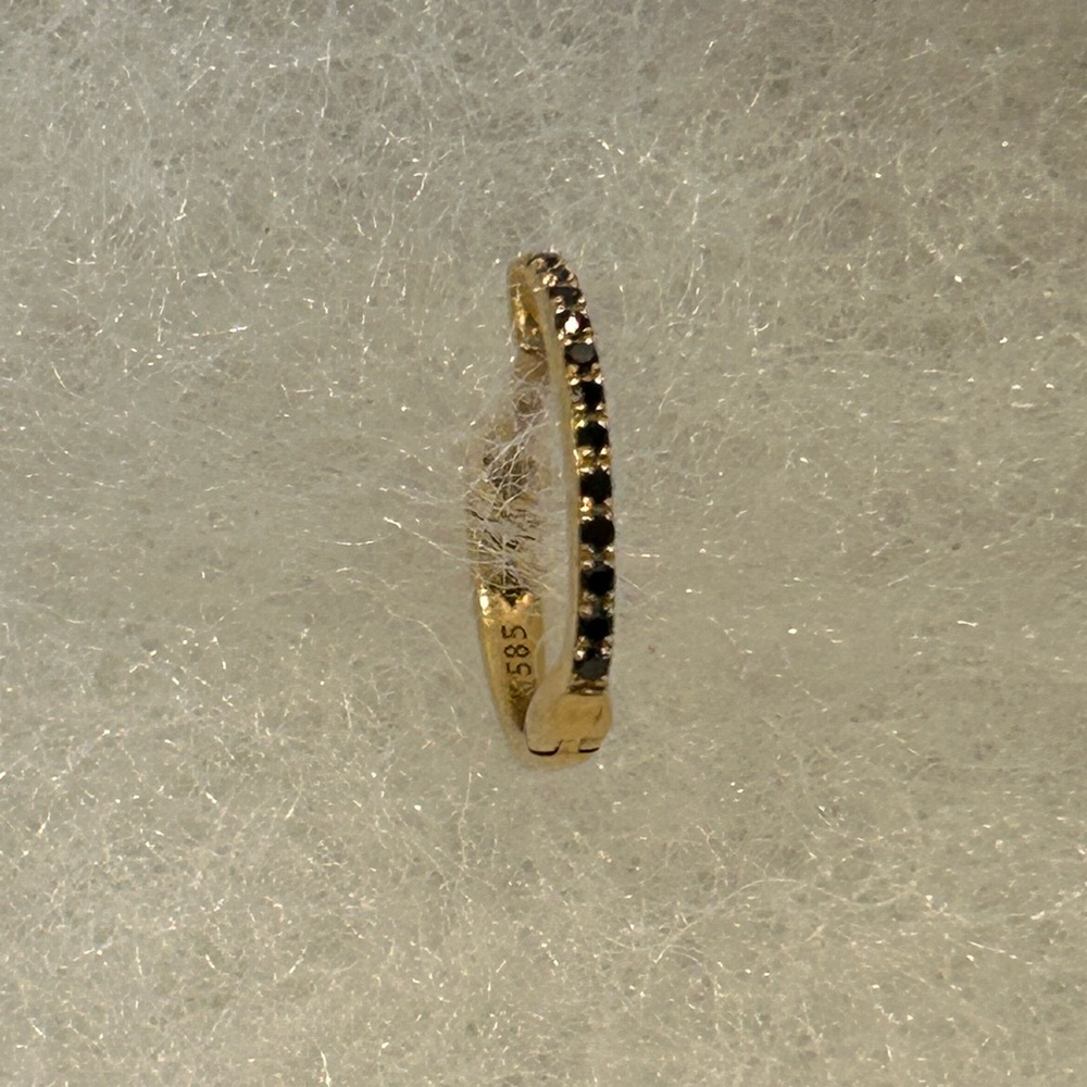 14K gold huggie earrings with small back diamonds